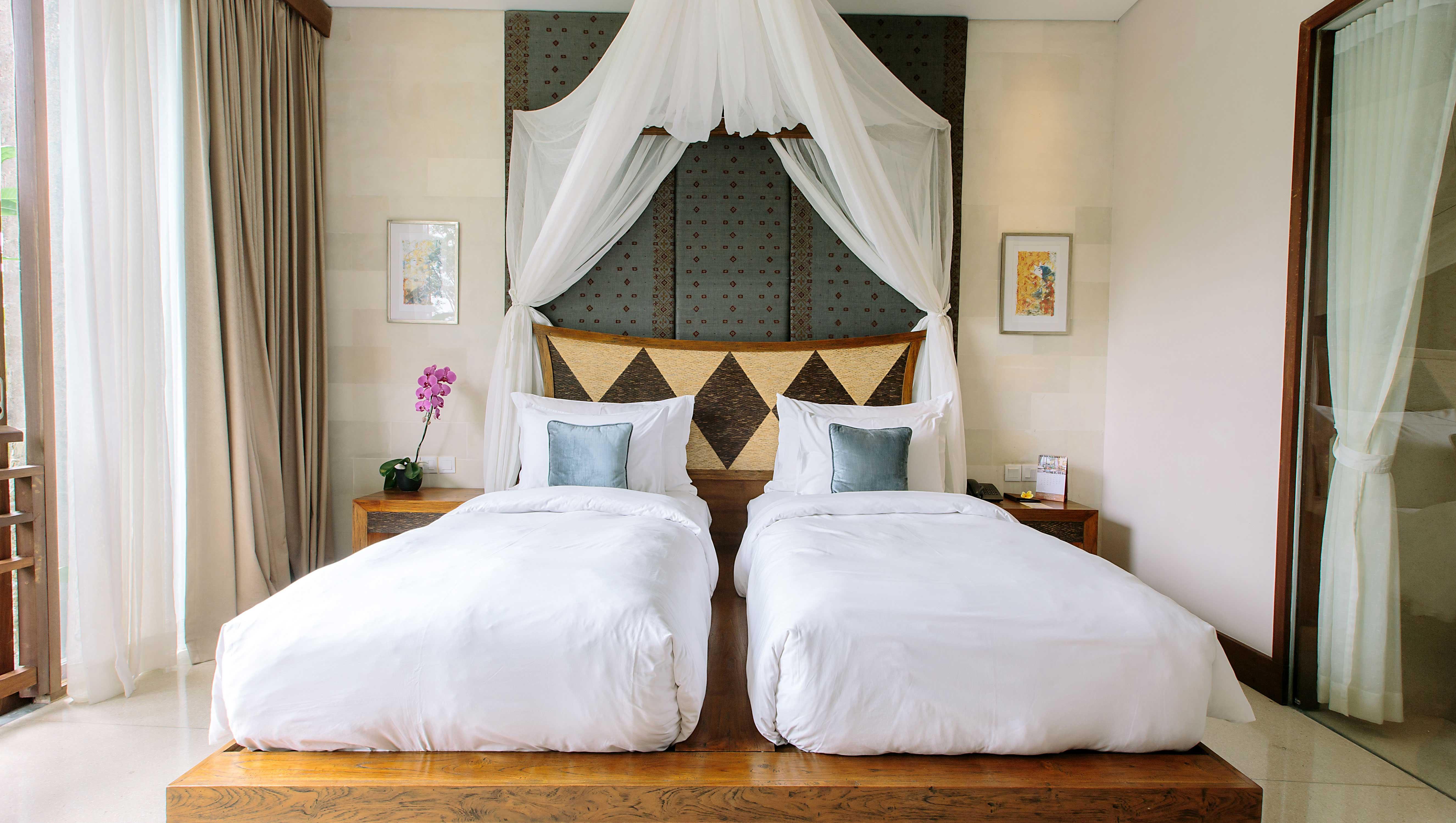 Tejaprana Resort & Spa Ubud Exterior foto A bed with mosquito netting